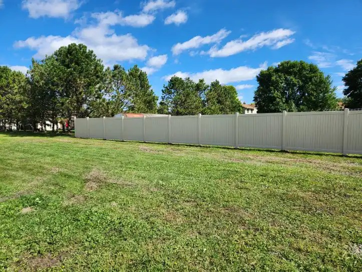 White privacy fencing around a residential yard